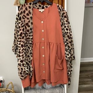 Salmon color dress. Cheetah duster